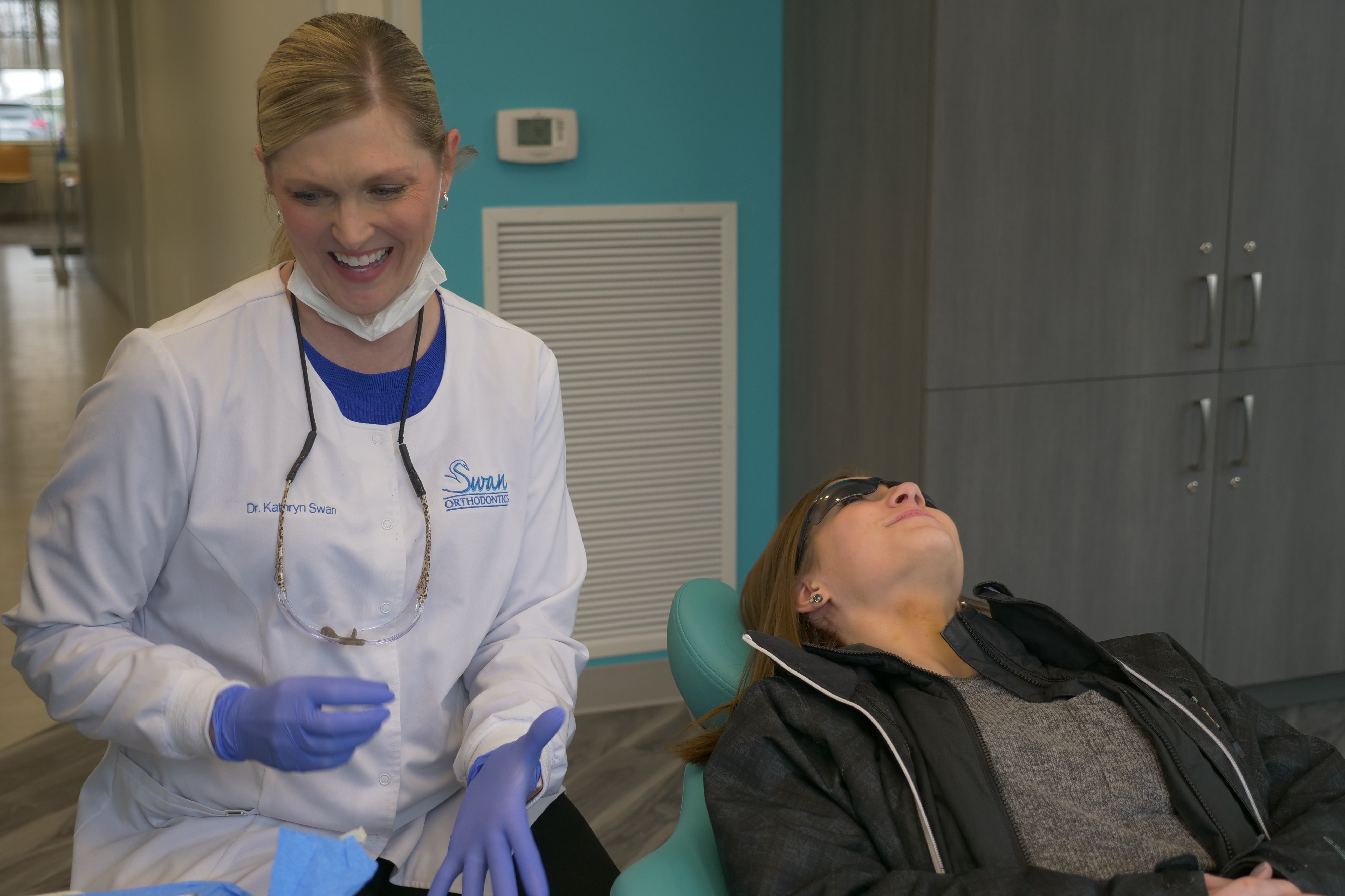 Swan staff working with a patient